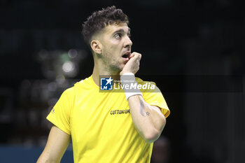 2024-11-21 - Thanasi Kokkinakis of Australia against Ben Shelton of USA during the 2024 Davis Cup Finals quarter-final tennis tie between United States (USA) and Australia at Palacio de Deportes Jose Maria Martin Carpena on November 21, 2024 in Malaga, Spain - TENNIS - DAVIS CUP 2024 - 1/4 - USA V AUSTRALIA - INTERNATIONALS - TENNIS