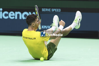 2024-11-21 - Thanasi Kokkinakis of Australia celebrates his victory against Ben Shelton of USA during the 2024 Davis Cup Finals quarter-final tennis tie between United States (USA) and Australia at Palacio de Deportes Jose Maria Martin Carpena on November 21, 2024 in Malaga, Spain - TENNIS - DAVIS CUP 2024 - 1/4 - USA V AUSTRALIA - INTERNATIONALS - TENNIS