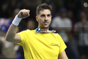 2024-11-21 - Thanasi Kokkinakis of Australia celebrates his victory against Ben Shelton of USA during the 2024 Davis Cup Finals quarter-final tennis tie between United States (USA) and Australia at Palacio de Deportes Jose Maria Martin Carpena on November 21, 2024 in Malaga, Spain - TENNIS - DAVIS CUP 2024 - 1/4 - USA V AUSTRALIA - INTERNATIONALS - TENNIS