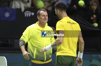 2024-11-21 - Thanasi Kokkinakis of Australia celebrates - with Captain Lleyton Hewitt - his victory against Ben Shelton of USA during the 2024 Davis Cup Finals quarter-final tennis tie between United States (USA) and Australia at Palacio de Deportes Jose Maria Martin Carpena on November 21, 2024 in Malaga, Spain - TENNIS - DAVIS CUP 2024 - 1/4 - USA V AUSTRALIA - INTERNATIONALS - TENNIS