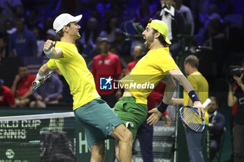 2024-11-21 - Matthew Ebden and Jordan Thompson of Australia celebrate their victory against Tommy Paul and Ben Shelton of USA during the 2024 Davis Cup Finals quarter-final tennis tie between United States (USA) and Australia at Palacio de Deportes Jose Maria Martin Carpena on November 21, 2024 in Malaga, Spain - TENNIS - DAVIS CUP 2024 - 1/4 - USA V AUSTRALIA - INTERNATIONALS - TENNIS