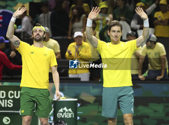 2024-11-21 - Jordan Thompson and Matthew Ebden of Australia celebrate their victory against Tommy Paul and Ben Shelton of USA during the 2024 Davis Cup Finals quarter-final tennis tie between United States (USA) and Australia at Palacio de Deportes Jose Maria Martin Carpena on November 21, 2024 in Malaga, Spain - TENNIS - DAVIS CUP 2024 - 1/4 - USA V AUSTRALIA - INTERNATIONALS - TENNIS