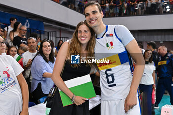 2024-07-16 - Simone Giannelli of Italy with his girlfriend - TEST MATCH - ITALY VS ARGENTINA - FRIENDLY MATCH - VOLLEYBALL