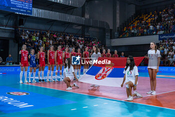 2024-07-09 - Serbia team during the National anthem - WOMEN'S TEST MATCH - ITALY VS SERBIA - FRIENDLY MATCH - VOLLEYBALL