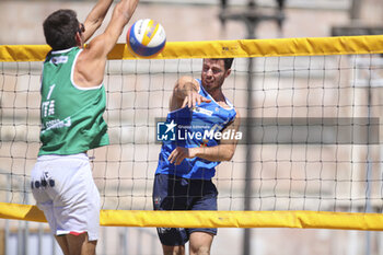 2024-06-23 - Davide Benzi (ITA) with a spike - WORLD BEACH PRO TOUR - BEACH VOLLEY - VOLLEYBALL