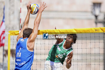 2024-06-23 - Carlo Bonifazi (ITA) with a block on Marco Viscovich (ITA) - WORLD BEACH PRO TOUR - BEACH VOLLEY - VOLLEYBALL