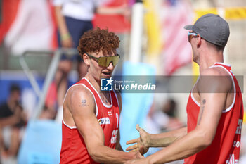 2024-06-23 - Maximilian Just (GER) and Robin Sowa (GER) celebration - WORLD BEACH PRO TOUR - BEACH VOLLEY - VOLLEYBALL