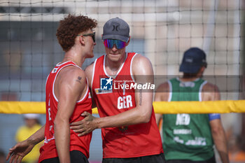 2024-06-23 - Maximilian Just (GER) and Robin Sowa (GER) celebration - WORLD BEACH PRO TOUR - BEACH VOLLEY - VOLLEYBALL