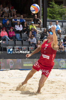 2024-07-07 - Gstaad Switzerland, 07/07/2024: Christian Sandlie Sorum (NOR) in action during final for third place of Swatch Beach Pro Gstaad 2024, Roy Emerson Arena in Gstaad. - SWATCH BEACH VOLLEY - BEACH VOLLEY - VOLLEYBALL