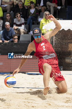 2024-07-07 - Gstaad Switzerland, 07/07/2024: Christian Sandlie Sorum (NOR) in action during final for third place of Swatch Beach Pro Gstaad 2024, Roy Emerson Arena in Gstaad. - SWATCH BEACH VOLLEY - BEACH VOLLEY - VOLLEYBALL