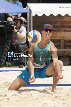 2024-07-07 - Gstaad Switzerland, 07/07/2024: Samuele Cottafava (ITA) in action during final for third place of Swatch Beach Pro Gstaad 2024, Roy Emerson Arena in Gstaad. - SWATCH BEACH VOLLEY - BEACH VOLLEY - VOLLEYBALL