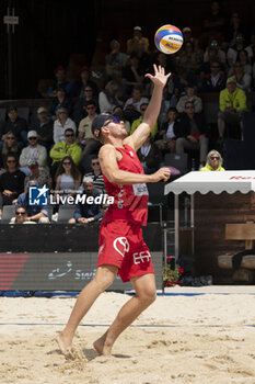 2024-07-07 - Gstaad Switzerland, 07/07/2024: Christian Sandlie Sorum (NOR) in action during final for third place of Swatch Beach Pro Gstaad 2024, Roy Emerson Arena in Gstaad. - SWATCH BEACH VOLLEY - BEACH VOLLEY - VOLLEYBALL