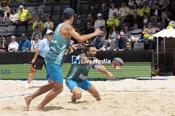 2024-07-07 - Gstaad Switzerland, 07/07/2024: Samuele Cottafava (ITA) and Paolo Nicolai (ITA) in action during final for third place of Swatch Beach Pro Gstaad 2024, Roy Emerson Arena in Gstaad. - SWATCH BEACH VOLLEY - BEACH VOLLEY - VOLLEYBALL