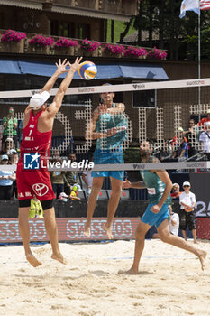 2024-07-07 - Gstaad Switzerland, 07/07/2024: Anders Berntsen Mol (NOR) against Samuele Cottafava (ITA) in action during final for third place of Swatch Beach Pro Gstaad 2024, Roy Emerson Arena in Gstaad. - SWATCH BEACH VOLLEY - BEACH VOLLEY - VOLLEYBALL