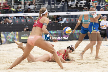 2024-07-07 - Gstaad Switzerland, 07/07/2024: Anastasija Samoilova (LAT) and Tina Grandina (LAT) in action during women third place final of Swatch Beach Pro Gstaad 2024, Roy Emerson Arena in Gstaad. - SWATCH BEACH VOLLEY - BEACH VOLLEY - VOLLEYBALL