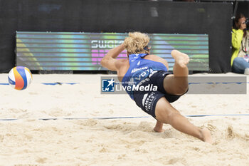 2024-07-07 - Gstaad Switzerland, 07/07/2024: David Ahman (SWE) in action during men final of Swatch Beach Pro Gstaad 2024, Roy Emerson Arena in Gstaad. - SWATCH BEACH VOLLEY - BEACH VOLLEY - VOLLEYBALL