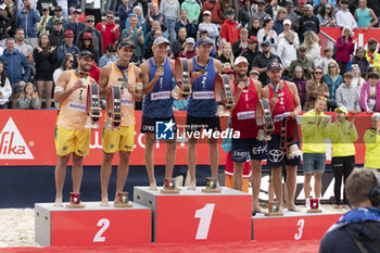 2024-07-07 - Gstaad Switzerland, 07/07/2024: podium ceremony during Swatch Beach Pro Gstaad 2024, Roy Emerson Arena in Gstaad. - SWATCH BEACH VOLLEY - BEACH VOLLEY - VOLLEYBALL