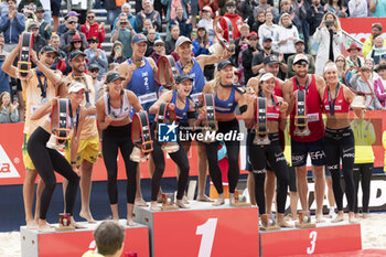 2024-07-07 - Gstaad Switzerland, 07/07/2024: podium ceremony during Swatch Beach Pro Gstaad 2024, Roy Emerson Arena in Gstaad. - SWATCH BEACH VOLLEY - BEACH VOLLEY - VOLLEYBALL