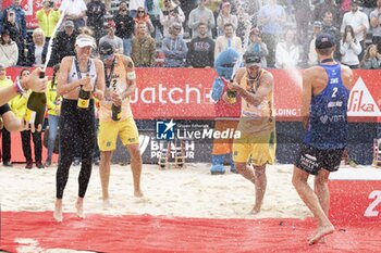 2024-07-07 - Gstaad Switzerland, 07/07/2024: podium ceremony during Swatch Beach Pro Gstaad 2024, Roy Emerson Arena in Gstaad. - SWATCH BEACH VOLLEY - BEACH VOLLEY - VOLLEYBALL