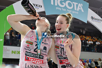 2024-04-27 - Kathryn Plummer of Prosecco Doc Imoco Conegliano and Isabelle Haak of Prosecco Doc Imoco Conegliano celebrate the victory - PLAYOFF - FINAL - SAVINO DEL BENE SCANDICCI VS PROSECCO DOC IMOCO CONEGLIANO - SERIE A1 WOMEN - VOLLEYBALL