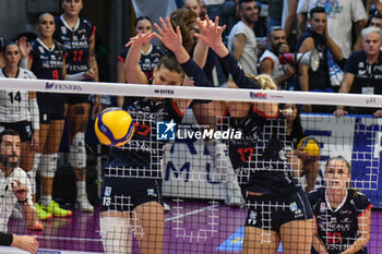 2024-10-06 - #13 Lucille Giquel and #17 Anna Gray of Chieri '76 in action during Italian women's Serie A1 Volleyball championship: Day 1 match beetween Reale Mutua Fenera Chieri '76 and Igor Gorgonzola Novara at Palafenera to Chieri (TO) - 6/10/2024 - REALE MUTUA FENERA CHIERI '76 VS IGOR GORGONZOLA NOVARA - SERIE A1 WOMEN - VOLLEYBALL