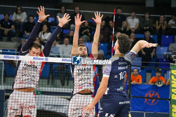 09/11/2024 - TOMMASO BAROTTO (POWERVOLLEY MILANO) AND MONSTER BLOCK FRANCESCO COMPARONI AND 21 GEORGI TATAROV (YUASA BATTERY GROTTAZZOLINA) - ALLIANZ MILANO VS YUASA BATTERY GROTTAZZOLINA - SUPERLEGA SERIE A - VOLLEY