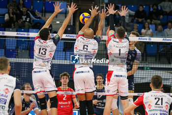 09/11/2024 - MONSTER BLOCK MICHELE FEDRIZZI,DANNY DEMYANENKO AND TSIMAFEI ZHUKOUSKI (YUASA BATTERY GROTTAZZOLINA) - ALLIANZ MILANO VS YUASA BATTERY GROTTAZZOLINA - SUPERLEGA SERIE A - VOLLEY