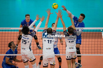 13/11/2024 - MONSTER BLOCK MATTEO PIANO, PAOLO PORRO AND OTSUKA TATSUNORI (POWERVOLLEY MILANO) AND MATTHIJS VERHANNEMAN (KNACK VOLLEY ROESELARE) - ALLIANZ MILANO VS KNACK ROESELARE - CHAMPIONS LEAGUE MEN - VOLLEY