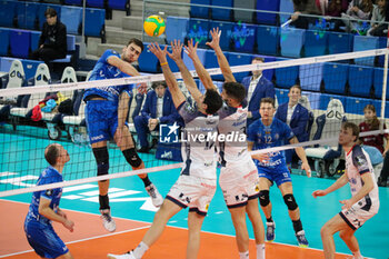 13/11/2024 - MONSTER BLOCK JACOPO LARIZZA AND YACINE LOUATI (POWERVOLLEY MILANO) AND LENNERT VAN ELSEN (KNACK VOLLEY ROESELARE) - ALLIANZ MILANO VS KNACK ROESELARE - CHAMPIONS LEAGUE MEN - VOLLEY