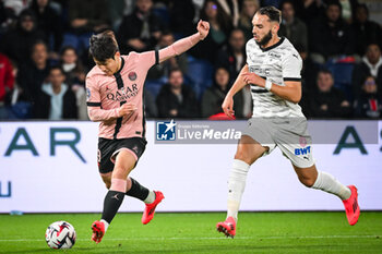 2025-09-27 - Lee KANG-IN of PSG and Amine GOUIRI of Rennes during the French championship Ligue 1 football match between Paris Saint-Germain and Stade Rennais (Rennes) on September 27, 2024 at Parc des Princes stadium in Paris, France - FOOTBALL - FRENCH CHAMP - PARIS SG V RENNES - FRENCH LIGUE 1 - SOCCER