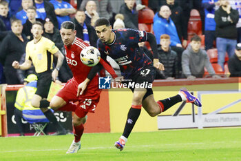 2025-02-26 - Ester Sokler (19) of Aberdeen and Leon Balogun (27) of Rangers during the Scottish championship Premiership football match between Aberdeen and Rangers on 30 October 2024 at Pittodrie Stadium in Aberdeen, Scotland - FOOTBALL - SCOTTISH CHAMP - ABERDEEN V RANGERS - SCOTTISH PREMIERSHIP - SOCCER