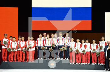 2019-10-04 - Teams podium men: first place for RUSSIA, second place for CHINA, third place for JAPAN - GINNASTICA ARTISTICA - MONDIALI DI STOCCARDA - GYMNASTICS - OTHER SPORTS