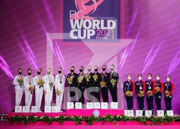 2021-05-30 - Award ceremony 5 balls Italy group team wins gold medal, Russian group team wins silver medal and Japan group team wins bronze medal during the Rhythmic Gymnastics FIG World Cup 2021 Pesaro at Vitrifrigo Arena, Pesaro, Italy on May 30, 2021 - Photo FCI / Fabrizio Carabelli - RHYTHMIC GYMNASTICS WORLD CUP 2021 - GYMNASTICS - OTHER SPORTS