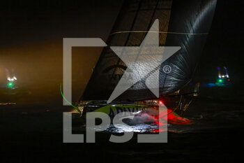 2021-01-27 - Charlie Dalin (fra) sailing on the Imoca Apivia during the arrival of the 2020-2021 VendÃ©e Globe, 9th edition of the solo non-stop round the world yacht race, on January 27th 2021 in Les Sables-d'Olonne, France - Photo Pierre Bouras / DPPI - ARRIVAL OF THE 2020-2021 VENDéE GLOBE, 9TH EDITION OF THE SOLO NON-STOP ROUND THE WORLD YACHT RACE - SAILING - OTHER SPORTS