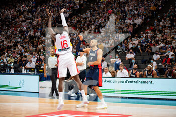 2021-07-10 - Usman Garuba of Spain and Nicolas Batum of France fight for the ball during the International Men's Friendly Basketball match between France and Spain on July 10, 2021 at AccorHotels Arena in Paris, France - Photo Antoine Massinon / A2M Sport Consulting / DPPI - INTERNATIONAL MEN'S FRIENDLY  MATCH - FRANCE VS SPAIN - FRIENDLY MATCH - BASKETBALL