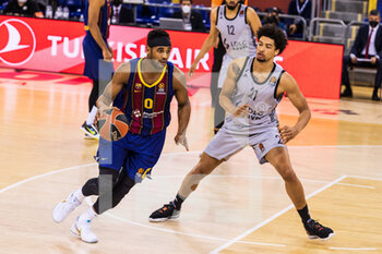 2021-02-26 - Brandon Davies of Fc Barcelona in action against Ismael Bako of LDLC ASVEL during the Turkish Airlines EuroLeague basketball match between FC Barcelona and LDLC ASVEL Villeurbanne on February 26, 2021 at Palau Blaugrana in Barcelona, Spain - Photo Javier Borrego / Spain DPPI / DPPI - FC BARCELONA AND LDLC ASVEL VILLEURBANNE - EUROLEAGUE - BASKETBALL