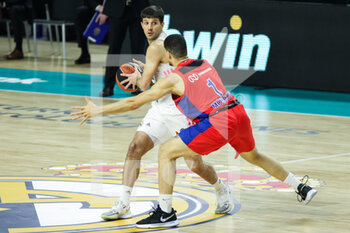 2021-03-18 - Nicolas Laprovittola of Real Madrid and Iffe Lundberg of CSKA Moscow during the Turkish Airlines EuroLeague basketball match between Real Madrid and CSKA Moscow on March 18, 2021 at Wizink Center stadium in Madrid, Spain - Photo Irina R Hipolito / Spain DPPI / DPPI - REAL MADRID AND CSKA MOSCOW - EUROLEAGUE - BASKETBALL