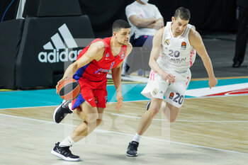 2021-03-18 - Iffe Lundberg of CSKA Moscow and Jaycee Carrol of Real Madrid during the Turkish Airlines EuroLeague basketball match between Real Madrid and CSKA Moscow on March 18, 2021 at Wizink Center stadium in Madrid, Spain - Photo Irina R Hipolito / Spain DPPI / DPPI - REAL MADRID AND CSKA MOSCOW - EUROLEAGUE - BASKETBALL