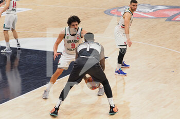 2021-05-12 - Jamal Olasewere (Atlante Eurobasket Roma)  contrastato da Andrea Benevelli (Urania Basket Milano)  - URANIA MILANO VS ATLANTE EUROBASKET ROMA - ITALIAN SERIE A2 - BASKETBALL