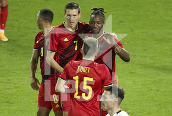 2020-11-11 - Michy Batshuayi of Belgium (right) celebrates his second goal with Thomas Foket and Hans Vanaken during the international friendly football match between Belgium and Switzerland on November 11, 2020 at King Power at Den Dreef Stadion in Leuven, Louvain, Belgium - Photo Jean Catuffe / DPPI - FRIENDLY FOOTBALL MATCH BETWEEN BELGIUM AND SWITZERLAND - FRIENDLY MATCH - SOCCER