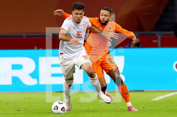 2020-11-11 - Rodri of Spain, Memphis Depay of The Netherlands during the International Friendly football match between Netherlands and Spain on november 11, 2020 at Johan Cruijff Arena in Amsterdam, Netherlands - Photo Marcel ter Bals / Orange Pictures / DPPI - FRIENDLY FOOTBALL MATCH BETWEEN NETHERLANDS AND SPAIN - FRIENDLY MATCH - SOCCER