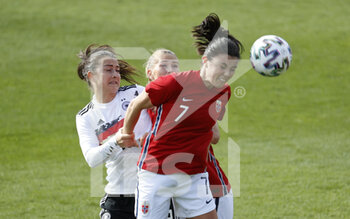 2021-04-13 - Ingrid Engen of Norway and Sara Daebritz of Germany during the International Women's Friendly football match between Germany and Norway on April 13, 2021 at Brita-Arena in Wiesbaden, Germany - Photo Heiko Becker / firo Sportphoto / DPPI - AMICHEVOLE NAZIONALE FEMMINILE 2021 - GERMANIA VS NORVEGIA - FRIENDLY MATCH - SOCCER