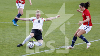 2021-04-13 - Alexandra Popp of Germany and Ingrid Engen of Norway during the International Women's Friendly football match between Germany and Norway on April 13, 2021 at Brita-Arena in Wiesbaden, Germany - Photo Heiko Becker / firo Sportphoto / DPPI - AMICHEVOLE NAZIONALE FEMMINILE 2021 - GERMANIA VS NORVEGIA - FRIENDLY MATCH - SOCCER