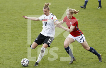 2021-04-13 - Alexandra Popp of Germany and Julie Blakstad of Norway during the International Women's Friendly football match between Germany and Norway on April 13, 2021 at Brita-Arena in Wiesbaden, Germany - Photo Heiko Becker / firo Sportphoto / DPPI - AMICHEVOLE NAZIONALE FEMMINILE 2021 - GERMANIA VS NORVEGIA - FRIENDLY MATCH - SOCCER