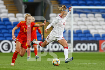 2021-04-13 - Denmark Stine Larsen (12) under pressure from Wales Ceri Holland (17) during the International Women's Friendly football match between Wales and Denmark on April 13, 2021 at the Cardiff City Stadium in Cardiff, Wales - Photo Dan Minto / ProSportsImages / DPPI - AMICHEVOLE FEMMINILE 2021 - GALLES VS DANIMARCA - FRIENDLY MATCH - SOCCER