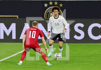 2021-06-02 - Leroy Sane of Germany and Christian Eriksen of Denmark during the Friendly Football match between Germany and Denmark on June 2, 2021 at Tivoli Stadion in Innsbruck, Austria - Photo Ralf Ibing / firo Sportphoto / DPPI - FRIENDLY MATCH 2021 - GERMANY VS DENMARK - FRIENDLY MATCH - SOCCER