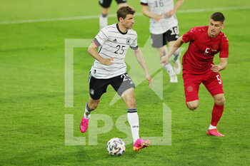 2021-06-02 - Thomas Mueller of Germany and Joakim Maehle of Denmark during the Friendly Football match between Germany and Denmark on June 2, 2021 at Tivoli Stadion in Innsbruck, Austria - Photo Ralf Ibing / firo Sportphoto / DPPI - FRIENDLY MATCH 2021 - GERMANY VS DENMARK - FRIENDLY MATCH - SOCCER