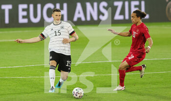 2021-06-02 - Niklas Sule of Germany and Yussuf Poulsen of Denmark during the Friendly Football match between Germany and Denmark on June 2, 2021 at Tivoli Stadion in Innsbruck, Austria - Photo Ralf Ibing / firo Sportphoto / DPPI - FRIENDLY MATCH 2021 - GERMANY VS DENMARK - FRIENDLY MATCH - SOCCER