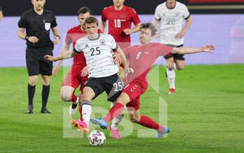 2021-06-02 - Thomas Mueller of Germany and Thomas Delaney of Denmark during the Friendly Football match between Germany and Denmark on June 2, 2021 at Tivoli Stadion in Innsbruck, Austria - Photo Ralf Ibing / firo Sportphoto / DPPI - FRIENDLY MATCH 2021 - GERMANY VS DENMARK - FRIENDLY MATCH - SOCCER