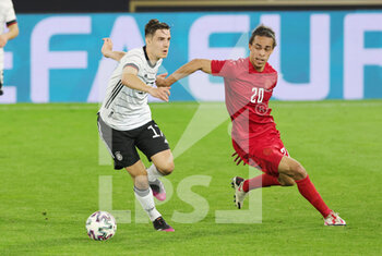 2021-06-02 - Florian Neuhaus of Germany and Yussuf Poulsen of Denmark during the Friendly Football match between Germany and Denmark on June 2, 2021 at Tivoli Stadion in Innsbruck, Austria - Photo Ralf Ibing / firo Sportphoto / DPPI - FRIENDLY MATCH 2021 - GERMANY VS DENMARK - FRIENDLY MATCH - SOCCER